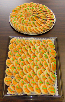 Two platters of decorated cookies for Integral Day.