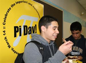 A student enjoys some pie on Pi Day